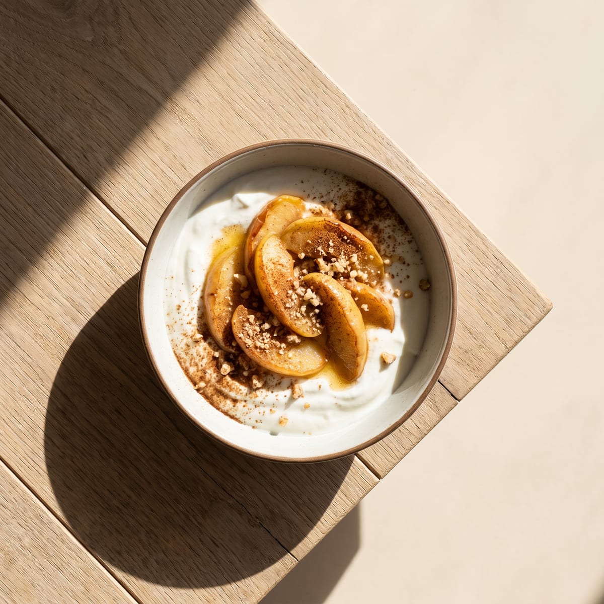 AI-generated photo: Warm cinnamon apples with skyr and ground walnuts