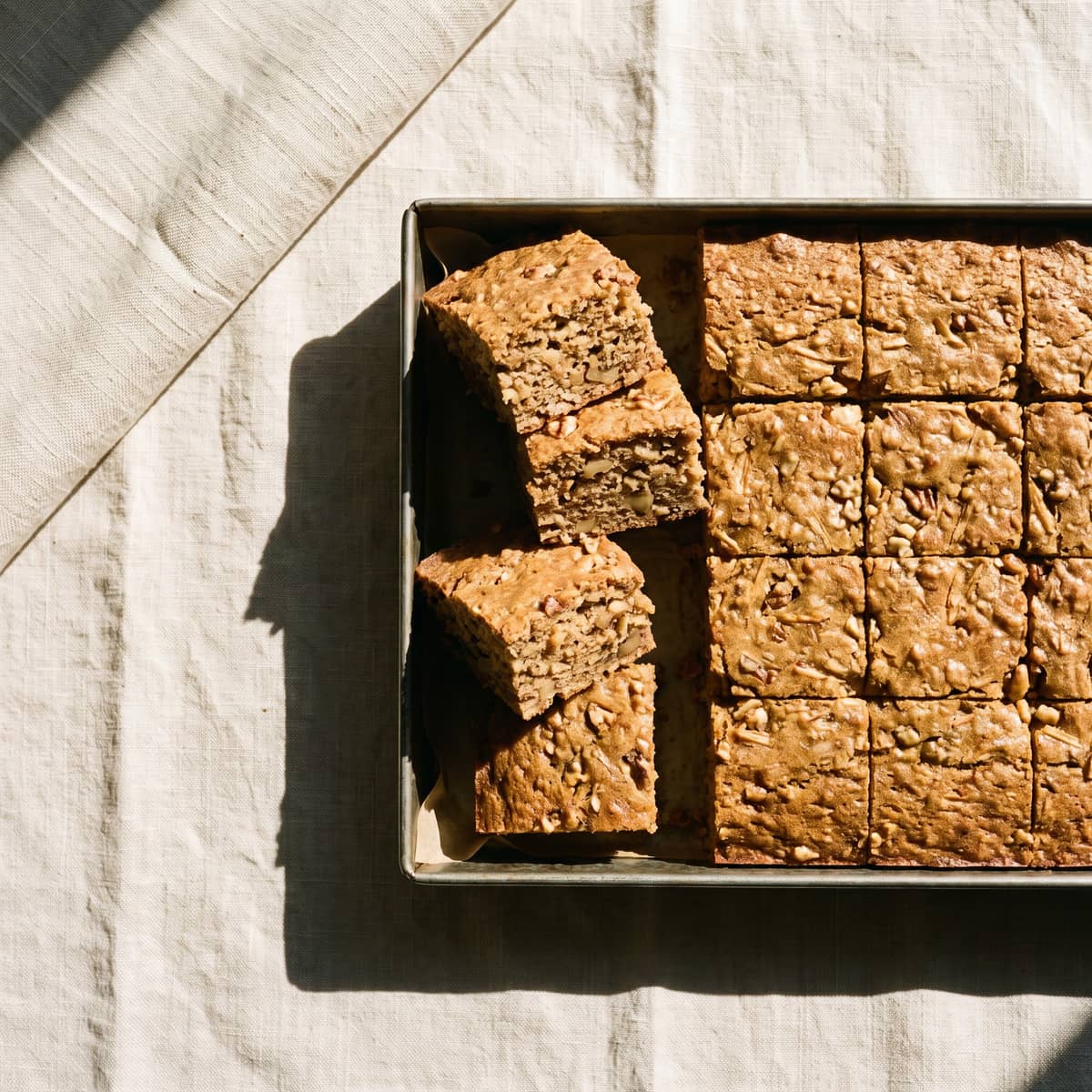 AI-generated photo: Baked apple and oat squares with walnuts