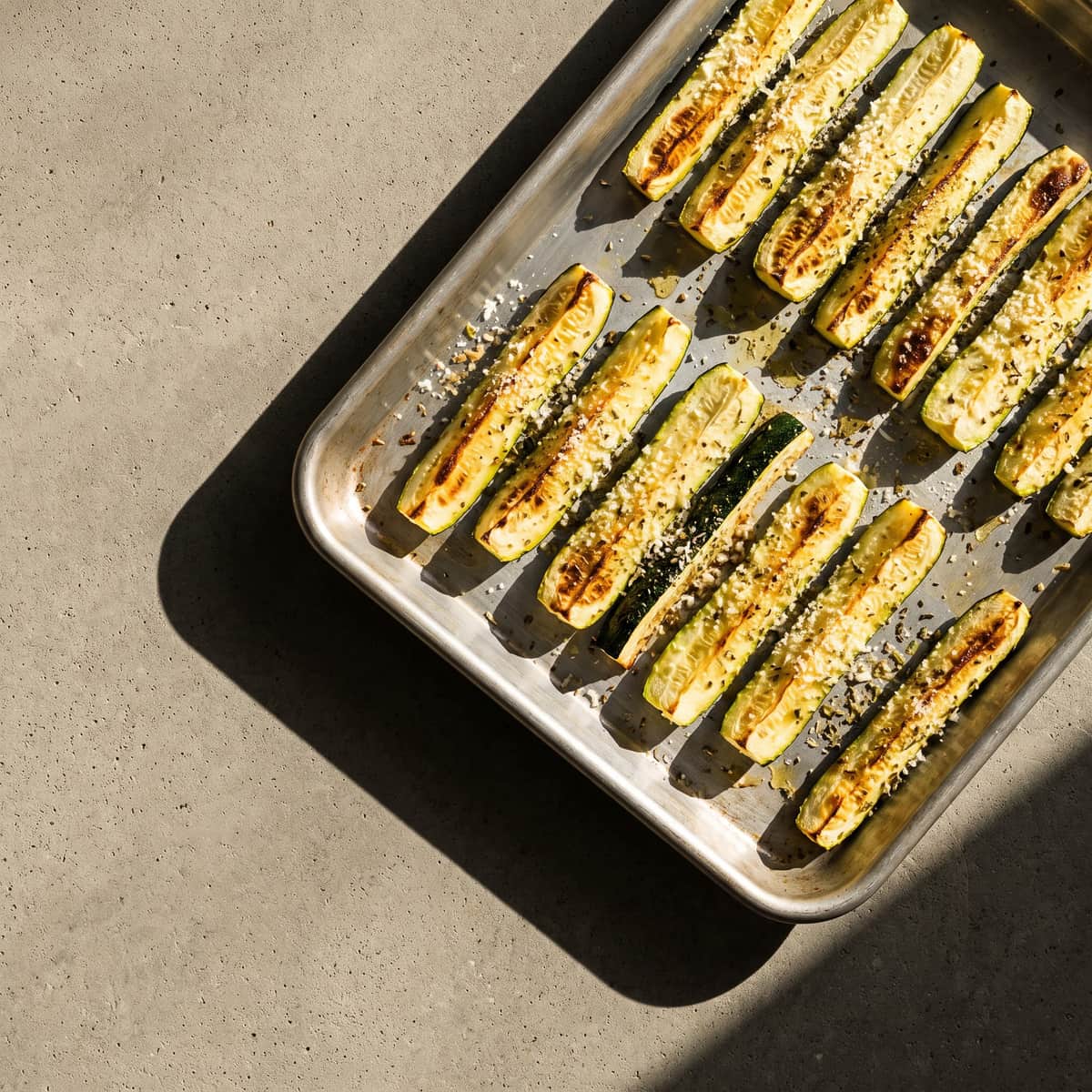 AI-generated photo: Oven zucchini sticks with parmesan and oregano
